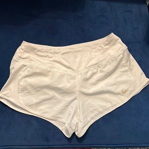White Nike athletic shorts. Size M